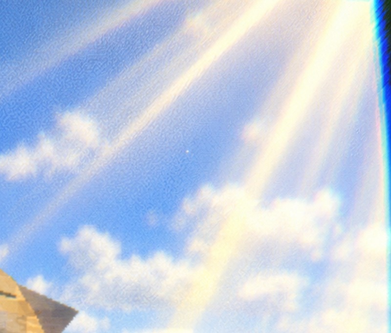 Warm rays crossing the blue sky